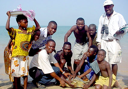 Saying good-bye to a sea turtle before being freed at Turtle Island